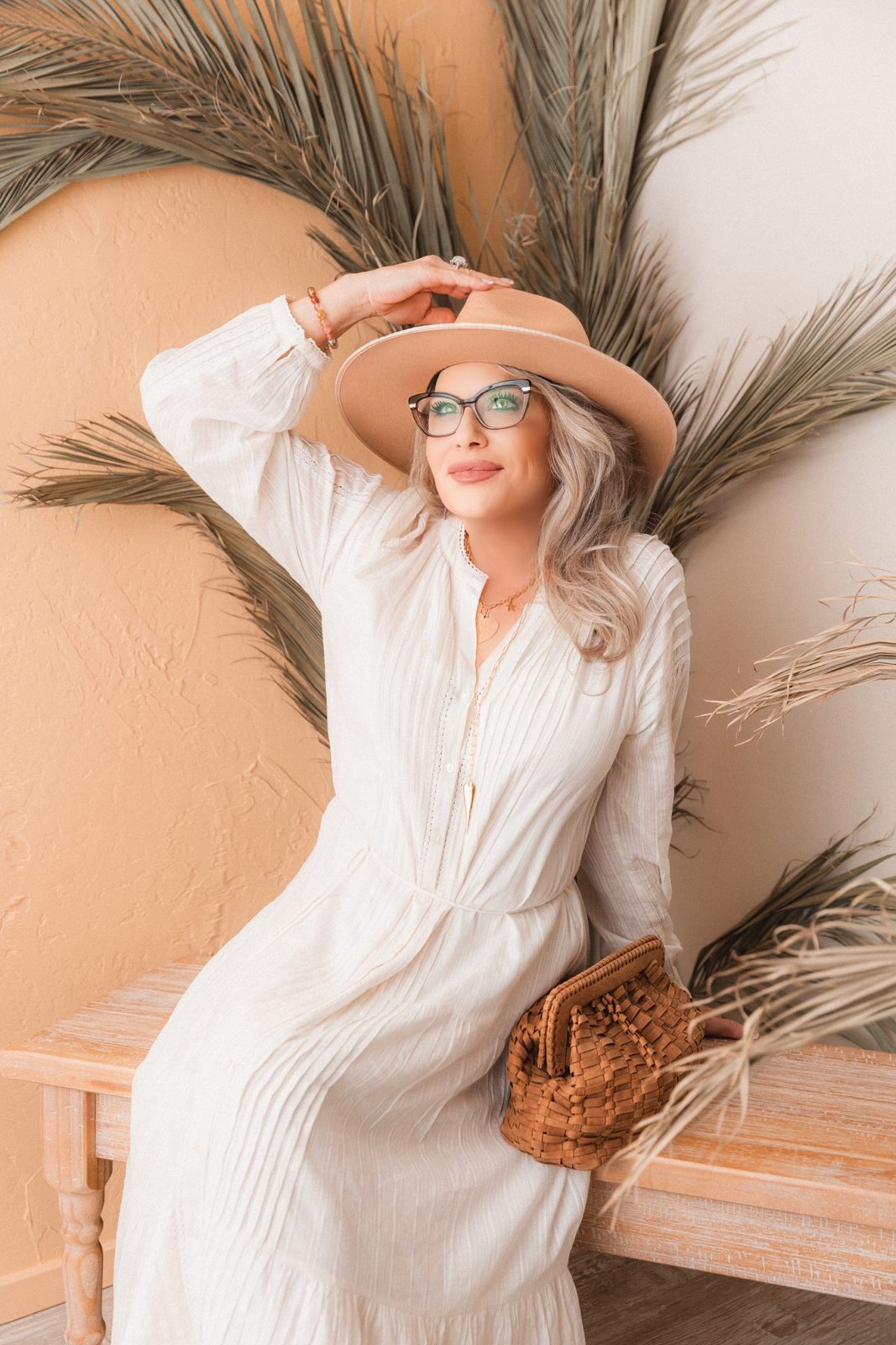 Susan Grau editorial portrait with hat